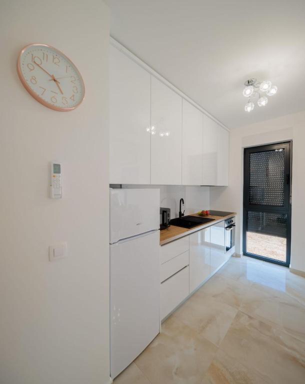 Modern short term rental apartment Limassol kitchen and balcony